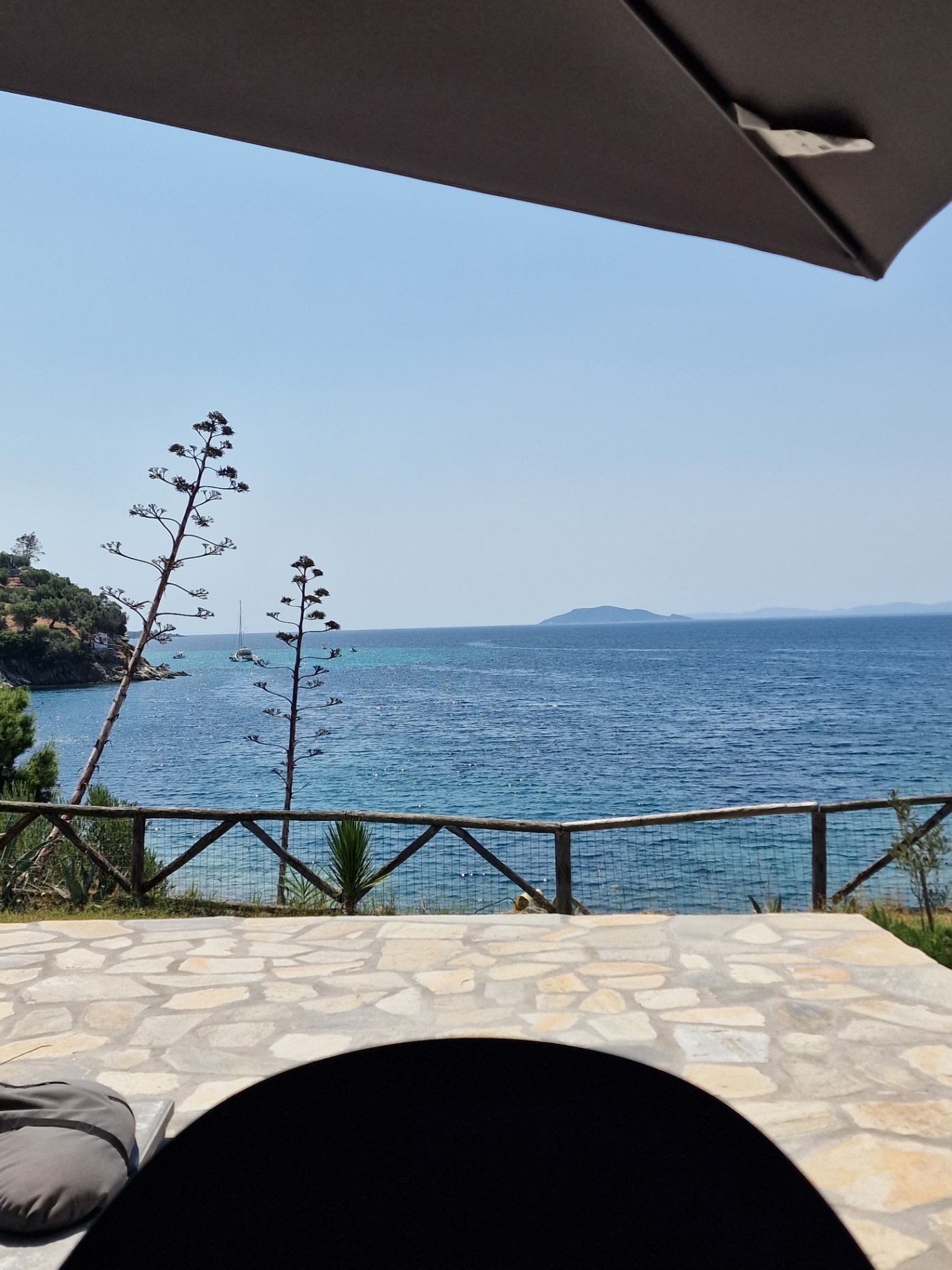 Shaded terrace looking out over the Aegean at Kalogria Beach