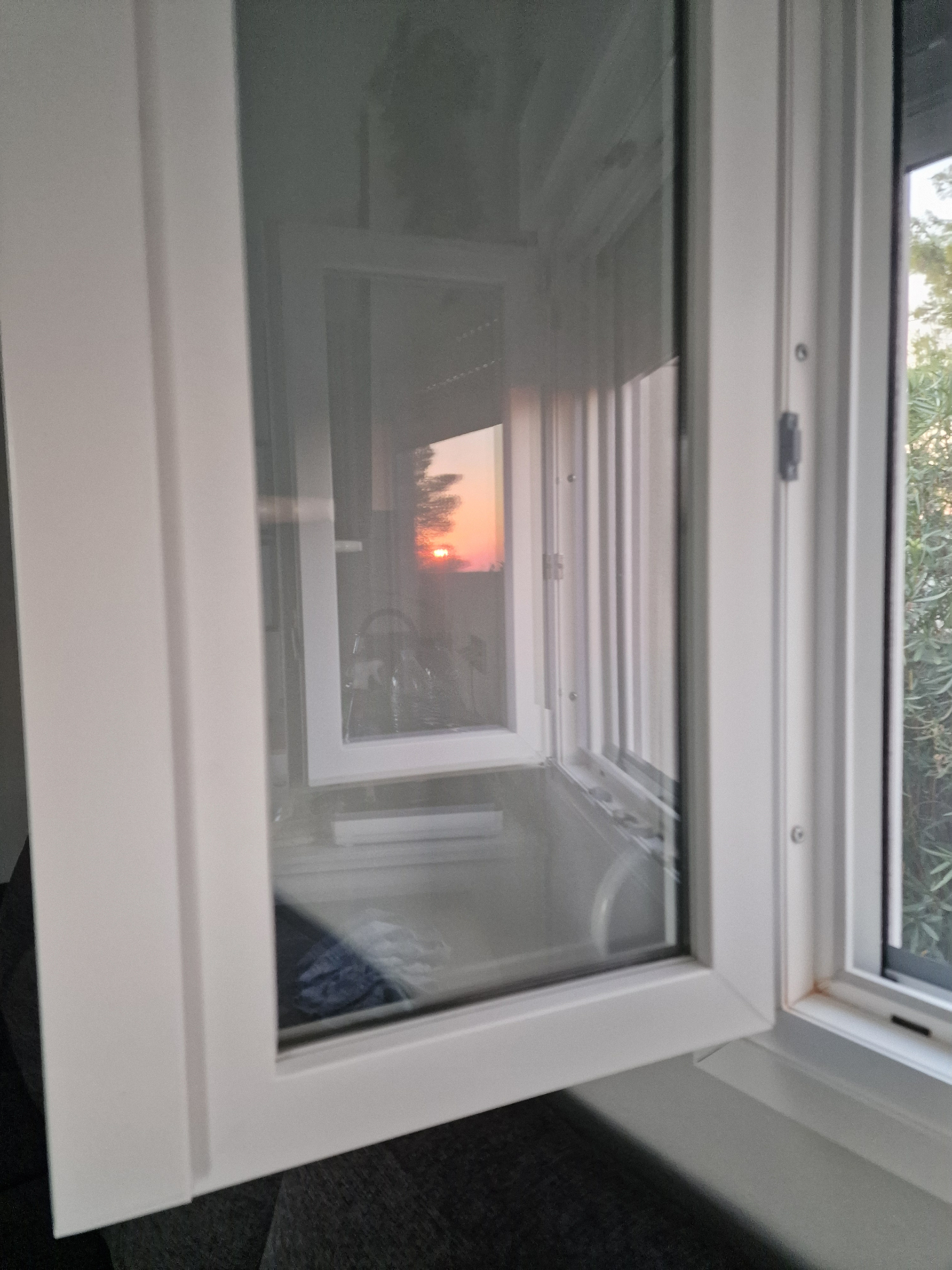 The low sun over the Aegean seen through the studio window
