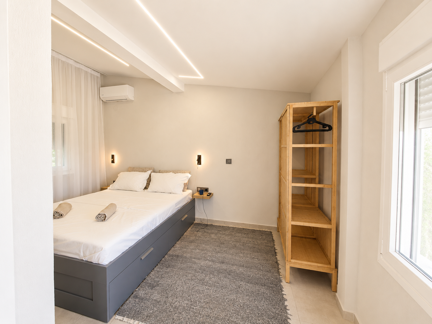 Bedroom with soft linens and ambient light